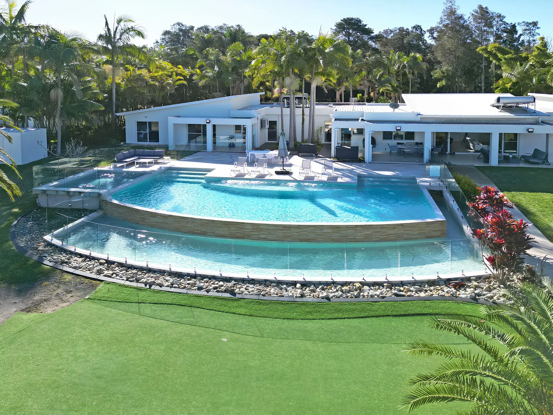 Lake Palm Resort Luxury Retreat absolute Waterfront on 3 acres at Lake Macquarie.